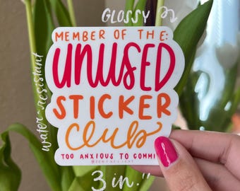 May include: Glossy sticker with the text "MEMBER OF THE: UNUSED STICKER CLUB TOO ANXIOUS TO COMMIT @SENTHELIGHT 3 in."