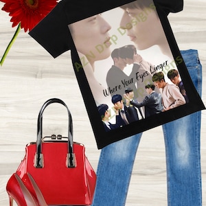 May include: Black t-shirt with a graphic print of a group of men. The graphic includes the text "Where Your Eyes Linger".