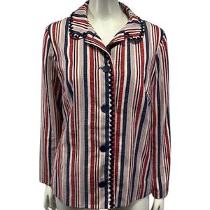 May include: A button-down striped jacket in red, white, and navy blue. The jacket features vertical stripes, a notched collar, and dark blue scalloped trim along the button line and collar. The jacket is displayed on a mannequin.
