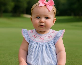 Combi-short bulle bleu marine à smocks bébé fille