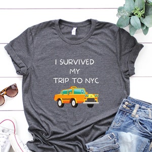 I Survived My Trip To NYC T Shirt New York City Vintage Style Unisex Gamer Cult Movie Music Yellow Taxi Meme Gift Funny Tee