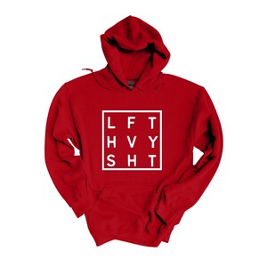 May include: Red hooded sweatshirt with a white graphic that says "LFT HVY SHT" in a square.