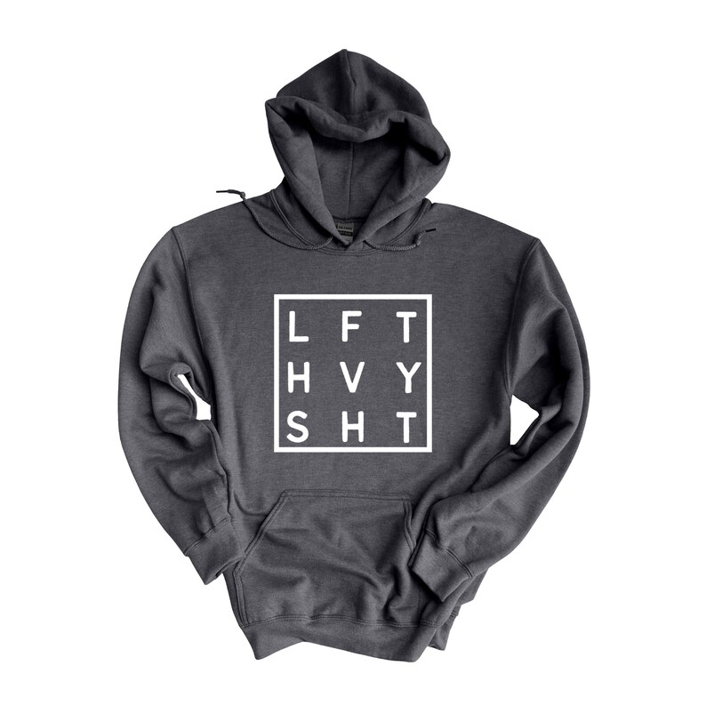 May include: A dark gray hooded sweatshirt with a white graphic print that says "LFT HVY SHT" in a square.
