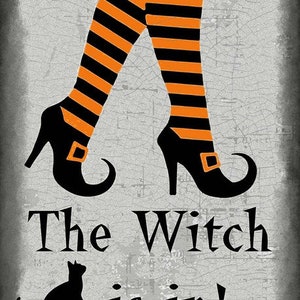 Metal sign  &quot; The Witch is In &quot;
