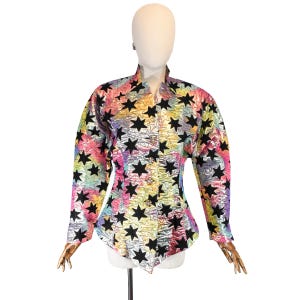 Chaqueta VINTAGE de lurex multicolor con estampado de estrellas y botones joya de los años 80.