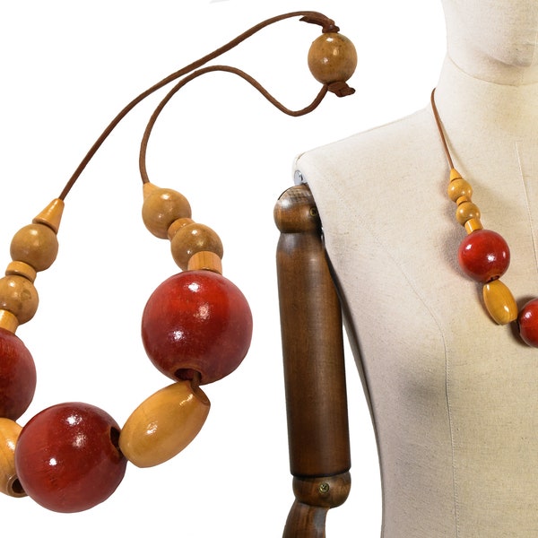 Collier VINTAGE de 1980 avec de grosses perles en bois et un cordon en cuir. Couleurs rouge et jaune.