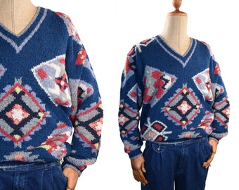 VINTAGE S. MORITZ pull. Pull-over tricoté avec col en V. "Ugly sweater" bleu vintage. 1990's