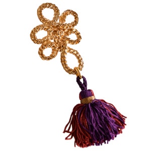 YSL ヴィンテージ ゴールデンノット ブローチ タッセル付き - ゴールドメタルのブローチまたはペンダント。デザイナーのイヴ・サンローランがフランスで製作。