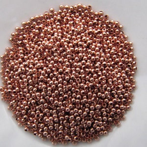 Size 15 Copper Plated Brass Seamed Seed Bead - 10 grams