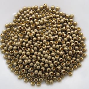 Size 11 Matte Brass Seamed Seed Bead - 10 grams