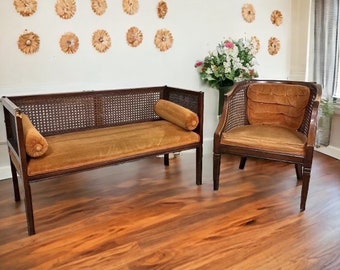 Matching Set of Mid Century American Cane Back & Sides Upholstered Banquette Entry Bench with Bolster Pillows and Barrel Chair