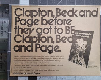 1972 Black and White Clapton, Beck, and Page "Guitar Boogie" Advertisement from Rolling Stone Newspaper-Magazine