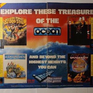 May include: A colorful advertisement for Atari ST video games from Ocean Software. The ad features a variety of games, including "Where Time Stood Still", "Army Moves", "Platypus", "Arknoid: Revenge of the Blob", and "Imagine: The Name of the Game". The ad is set against a background of a blue ocean and a red sky.