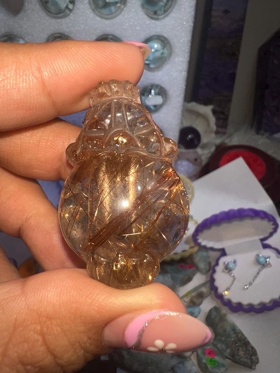 stunning red copper shooting star pixiu rutile