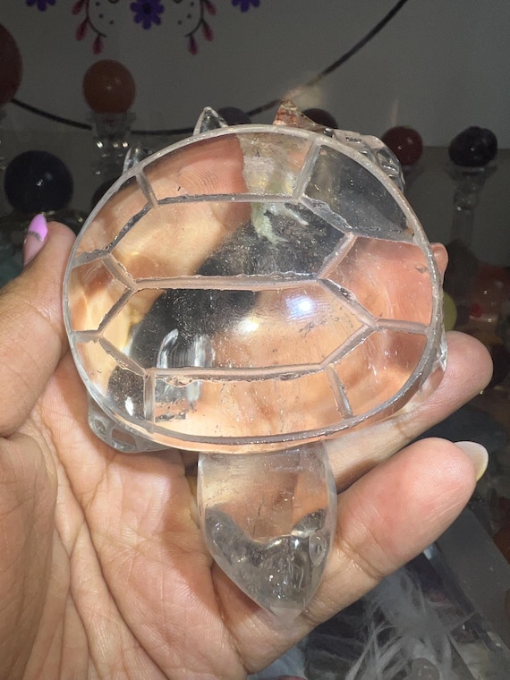 clear quartz with slight garden inclusions 4.4inches x 3.6 inches x 1.9 inches