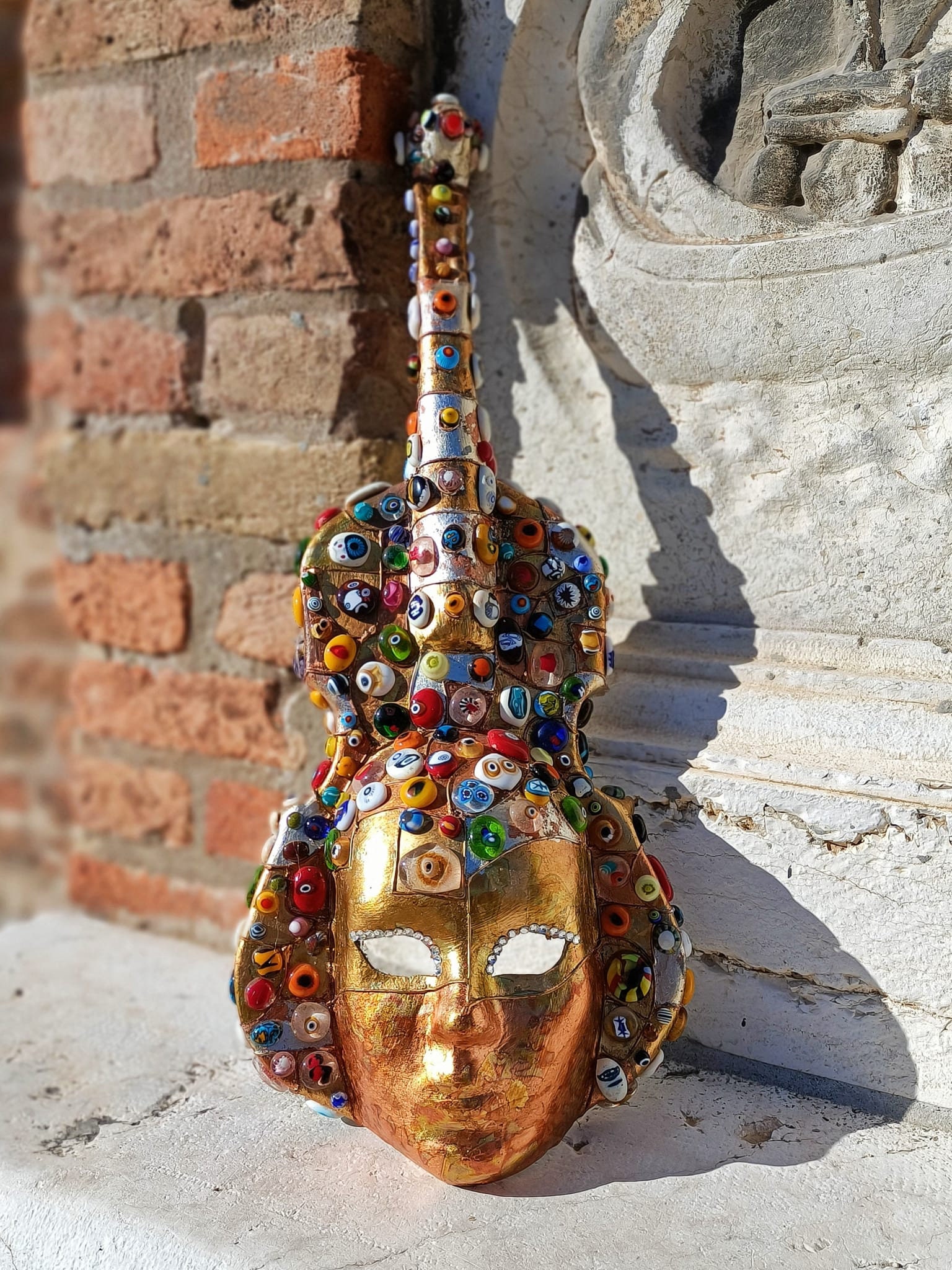 Papiermâché Violin and Multicolored Murano Glass Murrine. Murano Glass