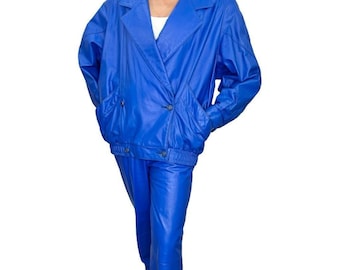 Completo vintage in pelle blu anni '80: giacca bomber a pipistrello, taglia 14/16
