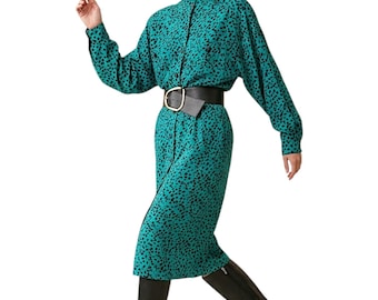 Conjunto de falda y top estilo power dress de los años 80 y 90 en verde y negro. Talla 8.