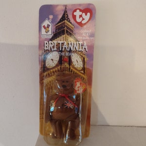 Vintage BRITANNIA TY  BEAR 1999.  McDonald International 1 Of 4 Collectible. Date Of Birth 12-15-1997. Rare Find Bear. Good Condition.