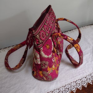 Vintage Vera Bradley Shoulder Bag. Floral Pattern With 6 Slip, And 1 Exterior Pockets. Zipper Closure. Good Condition.