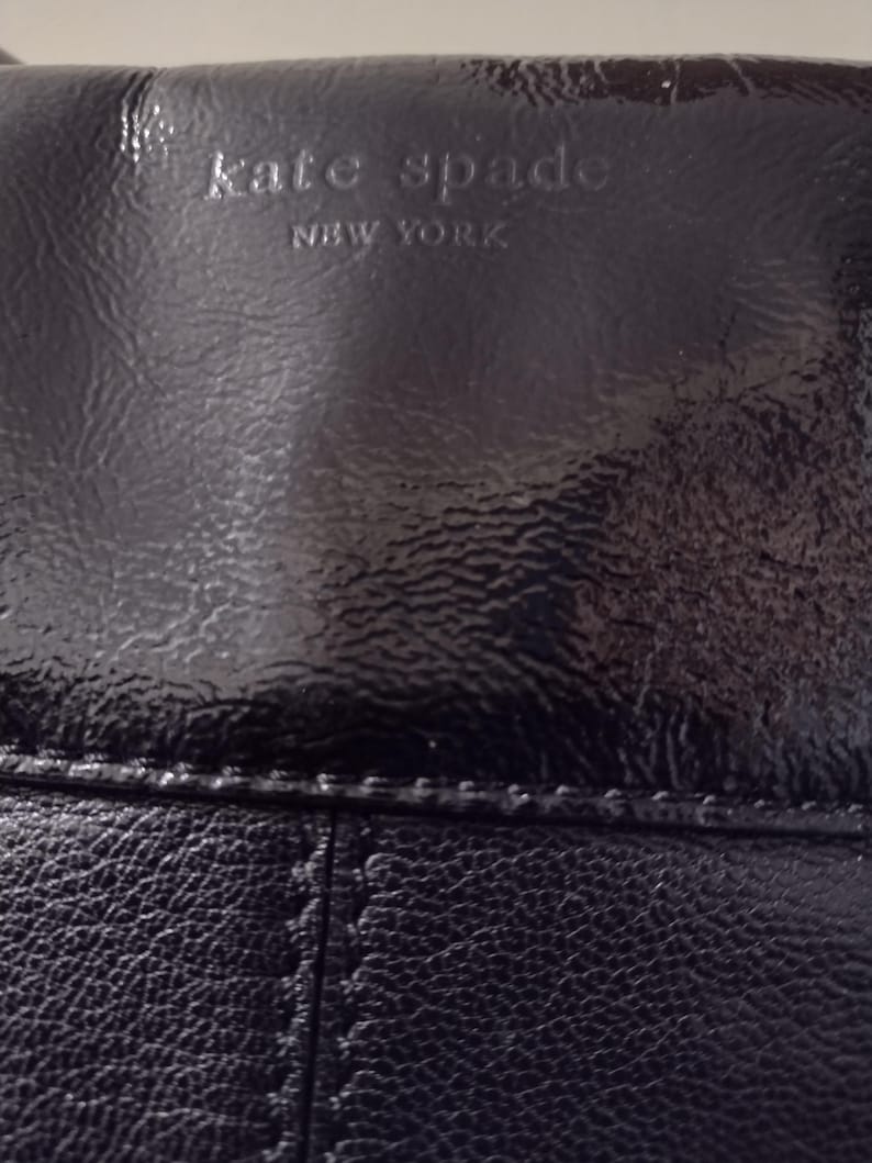 KATE SPADE BLACK LEATHER PURSE. EXCELLENT CONDITION. SIZE 10" HIGHT, 16" WIDE. MADE IN CHINA.
