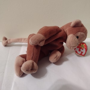 Vintage BONGO TY-Beanie Babies Collection. Original Beanie.  Homemade In China In 1995 # 4067. Retired. Tan Tail, Face, Hands,  And feet.