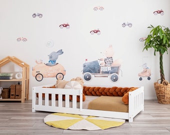 Cama infantil Montessori Vedo con barandilla de seguridad – Cama infantil blanca de madera natural con forma de casita.