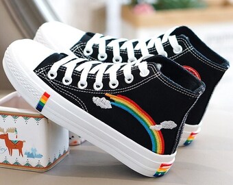 white converse with rainbow sole