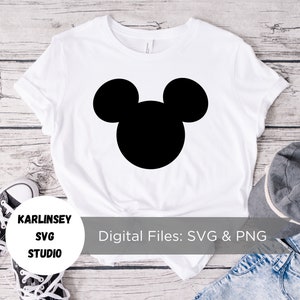 May include: White t-shirt with a black silhouette of Mickey Mouse's head. The text "Digital Files: SVG & PNG" is printed on the bottom of the shirt.