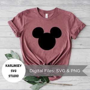 May include: A maroon t-shirt with a black Mickey Mouse silhouette design. The text "KARLINSEY SVG STUDIO" and "Digital Files: SVG & PNG" are printed on a white banner.