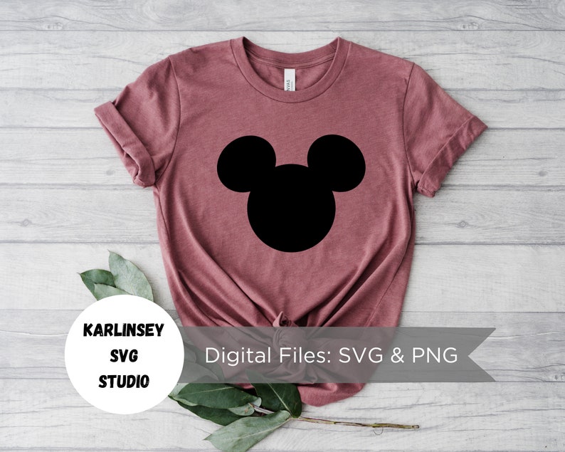 May include: A maroon t-shirt with a black Mickey Mouse silhouette design. The text "KARLINSEY SVG STUDIO" and "Digital Files: SVG & PNG" are printed on a white banner.