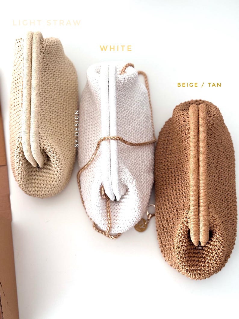 May include: Three crocheted clutch bags in light straw, white, and beige/tan. The light straw and beige/tan bags have a rounded shape with a matching handle. The white bag has a gold chain strap and a white clasp. The text "SY DESIGN" is visible.