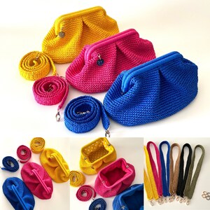 May include: Three crocheted handbags in yellow, pink, and blue with matching crocheted straps. The handbags are made with a textured, gathered fabric.
