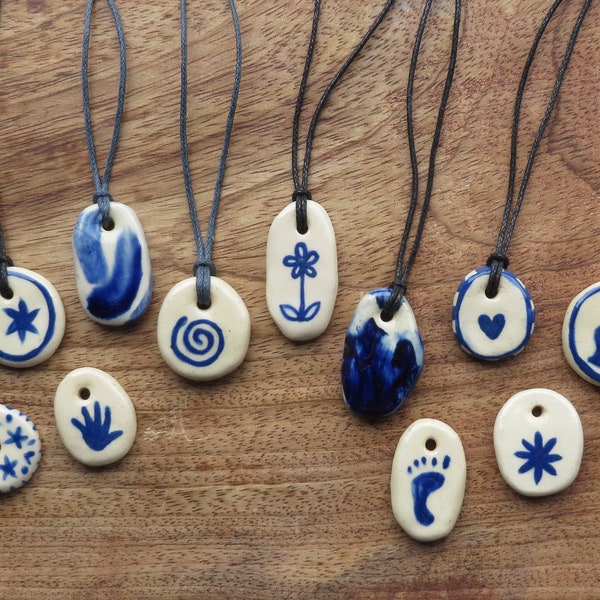 Handmade ceramic pendants on adjustable cord