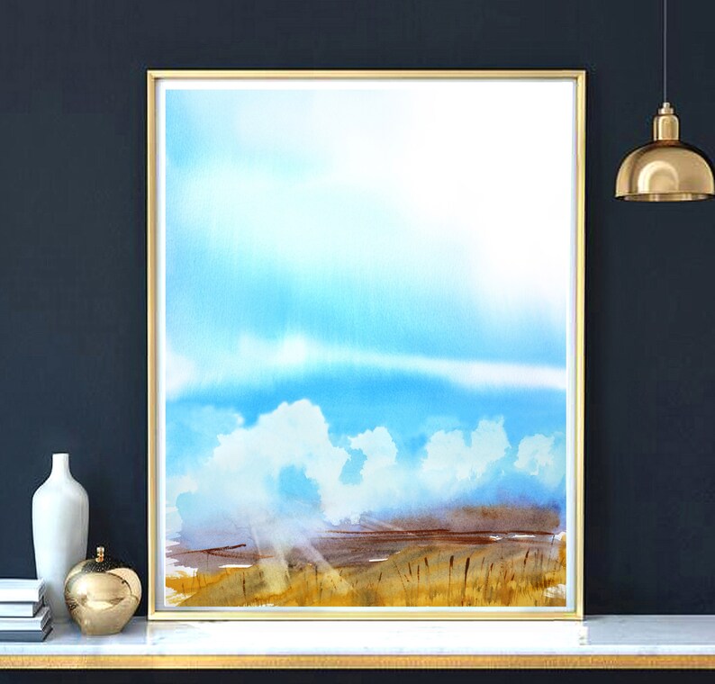 May include: A watercolor painting of a landscape with a blue sky and white clouds. The foreground is a field of tall grass with a brown and green color scheme.