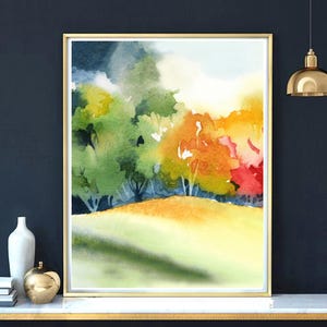 May include: Watercolor painting of a landscape with trees in shades of green, yellow, orange, and red. The trees are set against a background of a light blue sky and a yellow field.