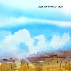 May include: A watercolor painting of a landscape with a blue sky and white clouds. The sun is shining through the clouds, casting rays of light on the ground. The ground is covered in brown grass and there are some tall, thin plants in the foreground.