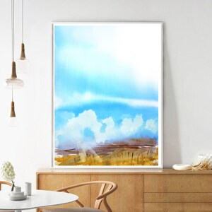 May include: A watercolor painting of a landscape with a blue sky and white clouds. The landscape is a field of tall grass with a few trees in the distance. The sun is shining brightly and the sky is a light blue.
