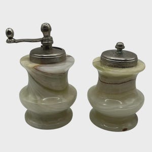 May include: A handmade, wooden serving tray with a natural finish. The tray features a rectangular shape with raised edges and integrated handles. Dimensions are approximately 16 inches long, 10 inches wide, and 2 inches high.