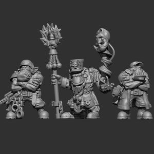 Puede incluir: Tres figuras en miniatura de plástico gris de orcos, una sosteniendo un bastón con una parte superior en llamas, otra sosteniendo un bastón con una calavera y la última sosteniendo un arma. Los orcos llevan uniformes militares y tienen rasgos exagerados.