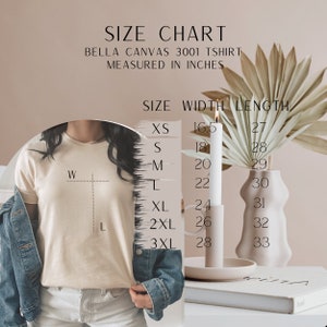 May include: Size chart for Bella Canvas 3001 t-shirts, measured in inches. The chart shows the width and length of the t-shirt in inches for sizes XS, S, M, L, XL, 2XL, and 3XL.