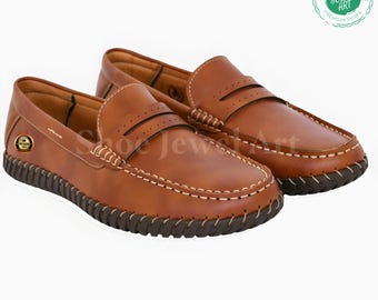 Handgemaakte leren loafers: klassieke instappers met ronde neus