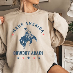 Make America Cowboy Again sweatshirt | Western graphic tee | Patriotic rodeo shirt | Rodeo gift | American western tee | Cowgirl shirt