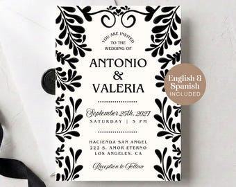 Puede incluir: Una tarjeta de invitación de boda blanca con bordes florales negros ornamentados y el texto: You are invited to the wedding of Antonio & Valeria, September 25th, 2027, Saturday, 5 PM, Hacienda San Angel, 222 S. Amor Eterno, Los Angeles, CA.