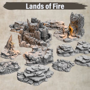 May include: A set of 10 grey, rocky terrain pieces for tabletop gaming. The pieces are designed to represent a volcanic landscape with craters and rock formations. The set includes a large, central piece with a cave opening and a smaller piece with a raised platform.