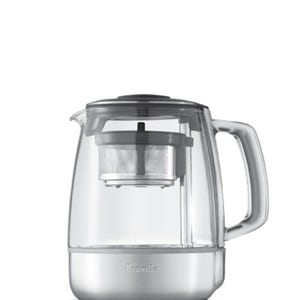 May include: The Tea Maker™ by Breville. A clear glass electric tea kettle with a stainless steel base and handle. The kettle has a built-in tea infuser and a black lid. The base has control buttons. The text "the Tea Maker" is at the top.