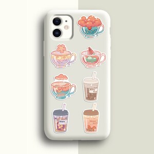 May include: A white phone case with colorful stickers of different drinks. The stickers feature a variety of designs, including clouds, stars, and fruit. The text on the stickers reads "Milky Tea", "Stars", and "Strawberry".