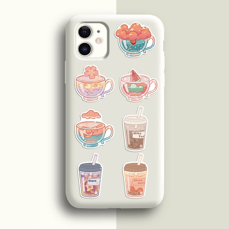 May include: A white phone case with colorful stickers of different drinks. The stickers feature a variety of designs, including clouds, stars, and fruit. The text on the stickers reads "Milky Tea", "Stars", and "Strawberry".