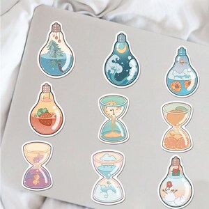 May include: Nine colorful stickers featuring various designs, including a lightbulb with a Christmas tree inside, a lightbulb with a snowman inside, a lightbulb with a strawberry inside, a lightbulb with a cloud inside, an hourglass with sand, an hourglass with water, an hourglass with fruit, and an hourglass with a clock inside.