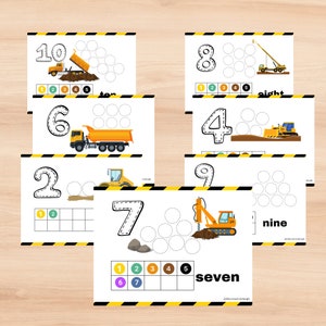 May include: A set of ten printable worksheets featuring construction vehicles and numbers 1 through 10. Each worksheet has a number, a vehicle, and a set of circles to count. The worksheets are designed for preschool and kindergarten children to learn number recognition and counting.